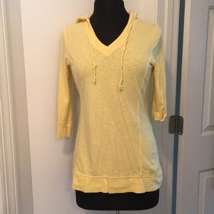 Yellow Danskin hooded top. Three quarter in sleeve
